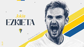 Persona con expresi n de entusiasmo o grito junto al texto que dice Jokin Ezkieta y un escudo deportivo sobre un fondo con franjas amarillas y azules. Descripci n generada con IA