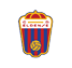A shield-shaped emblem with red and blue vertical stripes, a yellow volleyball at the bottom center, a crown-like design at the top, and the text “C ELDENSE" in red letters across a white horizontal band near the top. Descripci n generada con IA