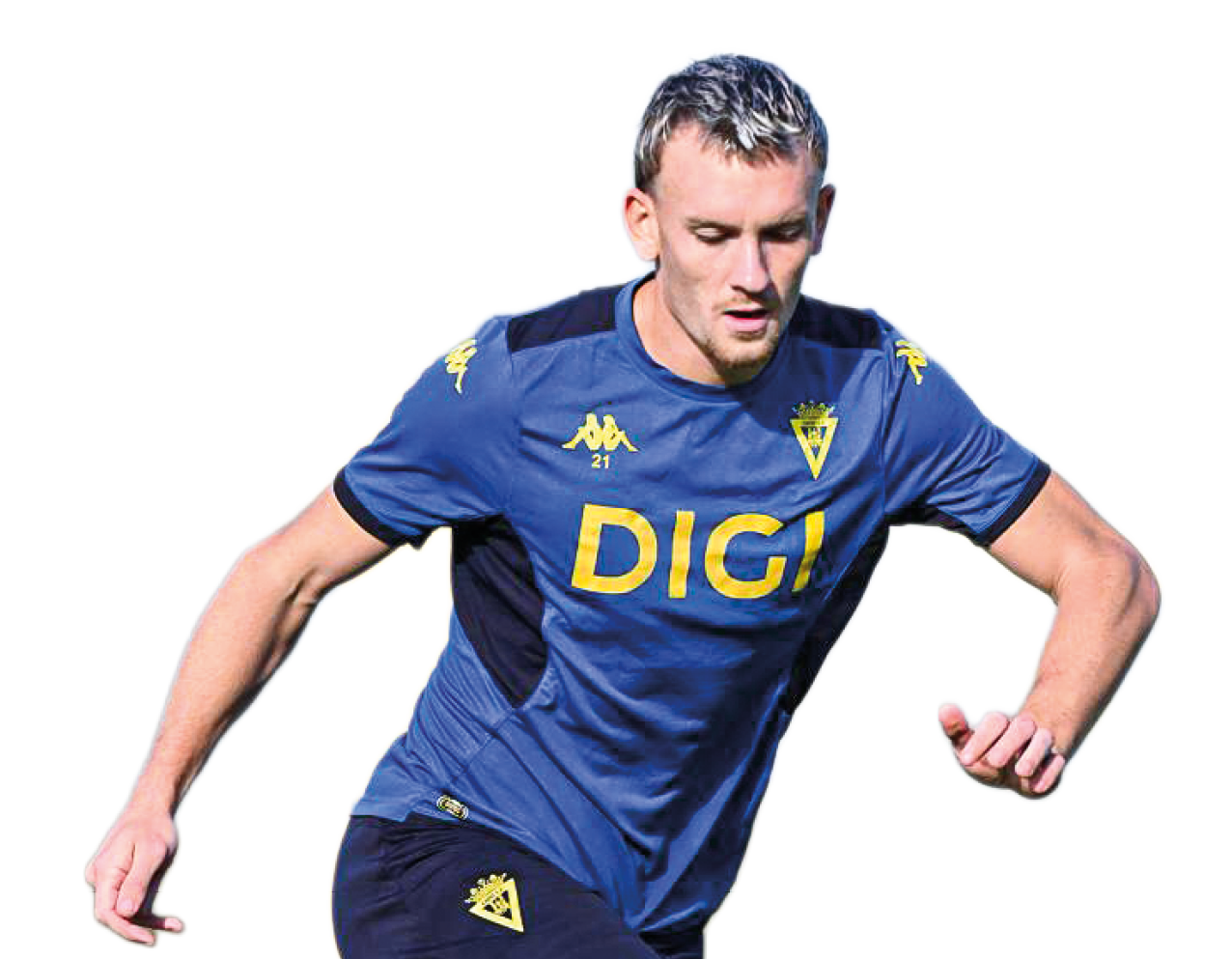 Una persona con ropa deportiva azul y amarilla est en movimiento, aparentemente entrenando o jugando f tbol.  Descripci n generada con IA